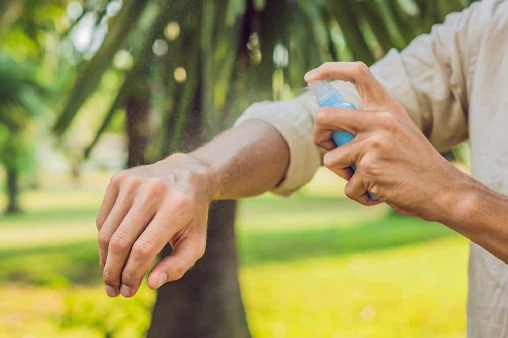 mosquito spray on arm